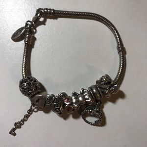 Pandora charm bracelet with 7 charms included